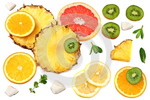 healthy background. slices of grapefruit, kiwi fruit, orange and pineapple isolated on white background top view