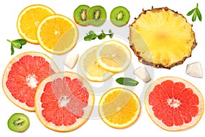 healthy background. slices of grapefruit, kiwi fruit, orange and pineapple isolated on white background top view