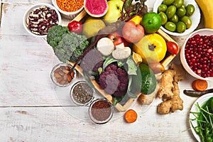 Healthy balanced vegan dieting concept. Vegetables fruit seeds beans ingredients for cooking. Organic vegetables, detox diet, clo