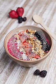 Healthy berries dessert with oat and yogurt