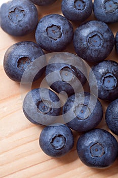 Healthy blueberries on a wooden desk