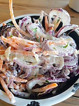 A Healthy bowl of mixed salad coleslaw photo