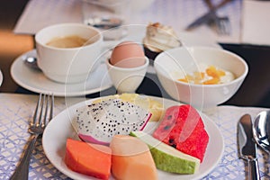 Healthy breackfast with fruits egg and coffee