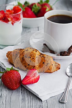 healthy breackfast for healthy Breakfast with delicious croissant and strawberries for early morning