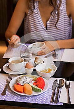 Healthy breackfast for two with fruits egg and coffee