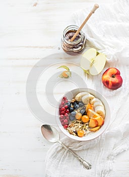 Healthy breakfast. Bowl of oat granola with yogurt