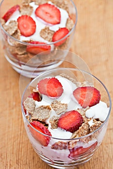 Healthy breakfast of bran flakes with yogurt