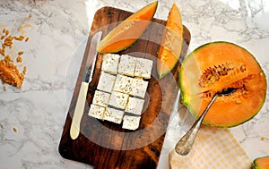 Healthy breakfast with cantaloupe and feta cheese