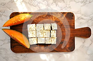 Healthy breakfast with cantaloupe and feta cheese