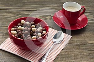 A healthy breakfast cereal balls with milk and coffee