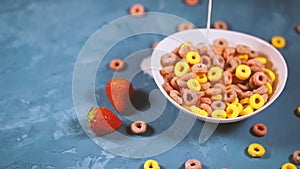 Healthy breakfast with cereal and berries. From above of bowl with delicious healthy breakfast made with colorful cereal