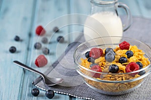 Healthy breakfast cereal with berries and milk