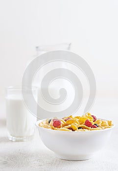 Healthy breakfast with cereal and blueberry and raspberry