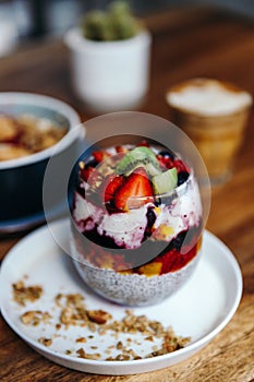 Healthy breakfast with chia strawberry pudding, oatmeal bowl