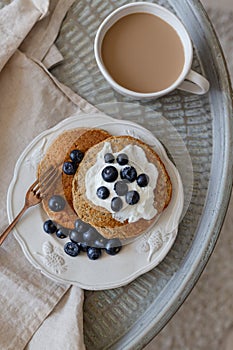 Healthy breakfast concept. Coffee with milk and oatmeal pancake
