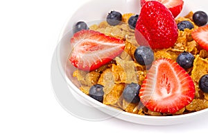 Healthy breakfast with corn flakes and fruits