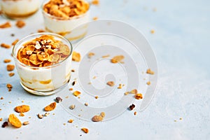 Healthy breakfast. Corn flakes with yogurt, almond and honey