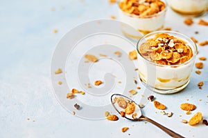 Healthy breakfast. Corn flakes with yogurt, almond and honey