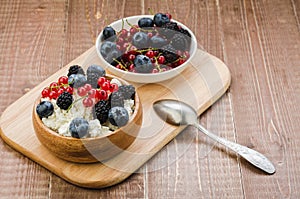 Healthy breakfast - cottage cheese with berries/Healthy breakfast - cottage cheese with berries - health and diet concept. select
