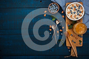 A healthy breakfast on a dark blue wooden background