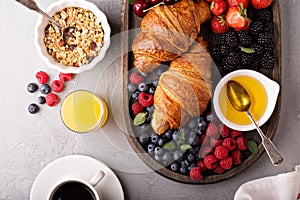 Healthy breakfast with freshly baked croissants and berries