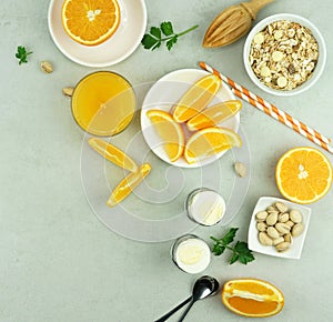 Healthy breakfast of freshly squeezed orange juice and pistachio nuts