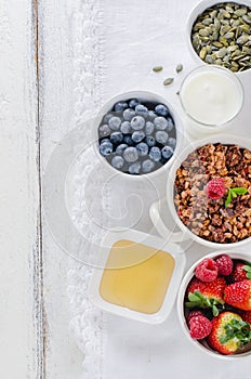 Healthy breakfast with granola, berries