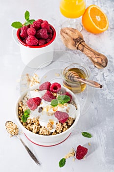 Healthy breakfast with granola and berries