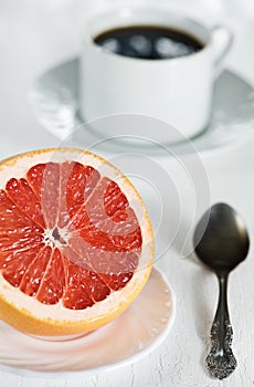 Healthy breakfast with grapefruit and coffee