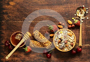 Healthy breakfast with homemade granola, berries and muesli