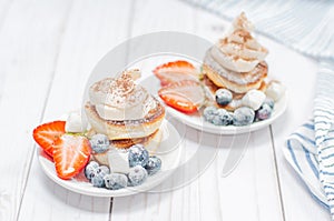 Healthy breakfast, homemade pancakes with fresh berries