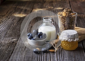 Healthy breakfast ingredients. Cereal, chocolate muesli, fresh blueberries