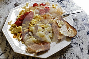 Healthy Breakfast Meal of Scrambled Eggs, Vegetables and Toast