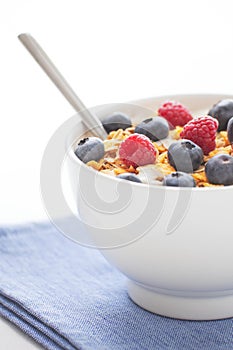 Healthy breakfast with muesli, fresh fruit and yoghurt
