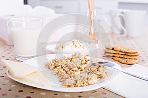 Healthy breakfast of oatmeal, biscuits and milk