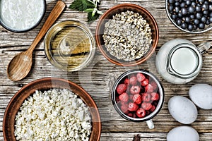 Healthy breakfast. Oatmeal with fruit on the table, wooden background