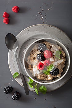 Healthy breakfast oatmeal porridge with raspberry blackberry