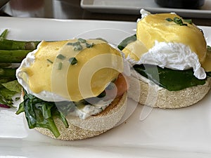 Healthy breakfast poached eggs with smoked salmon and spinach