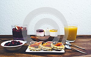 Healthy breakfast set on rustic wooden table.