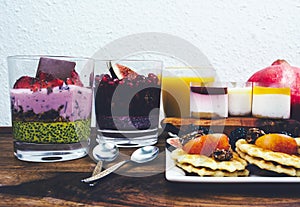 Healthy breakfast set on rustic wooden table.