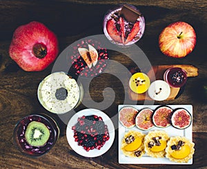 Healthy breakfast set on rustic wooden table.