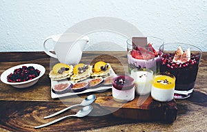 Healthy breakfast set on rustic wooden table.