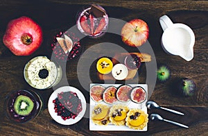 Healthy breakfast set on rustic wooden table.