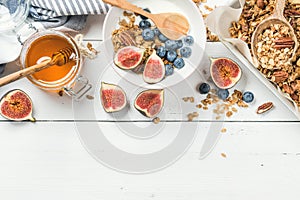 Healthy breakfast set on white wooden background, copy space