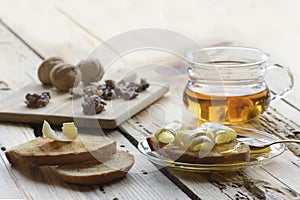 Healthy breakfast with slices of toast bread with butter curl and honey