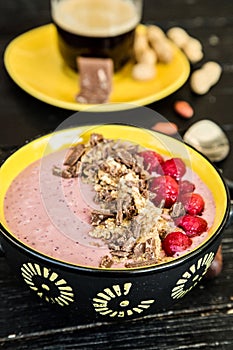 Healthy breakfast. Smoothie bowl with frozen fruits, greek yogurt and cereals