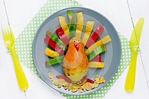 Healthy breakfast or snack for kids - turkey from pear and color