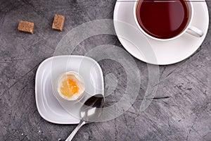Healthy breakfast. Soft-boiled egg with tea