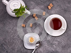 Healthy breakfast. Soft-boiled egg with tea