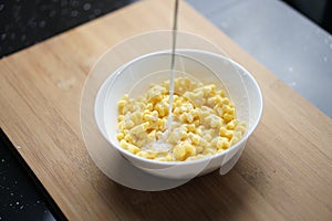 Healthy Breakfast. Star shape cereal on a white bowl